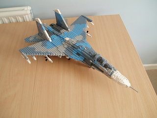 Illustration for article titled Giant LEGO B-1B Bomber Escorted by Fighters, Hawkeye Aircraft